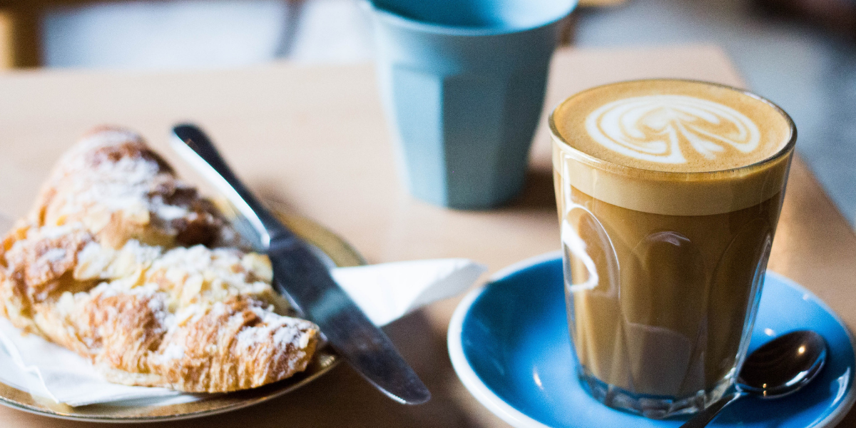 Image of coffee and croissant